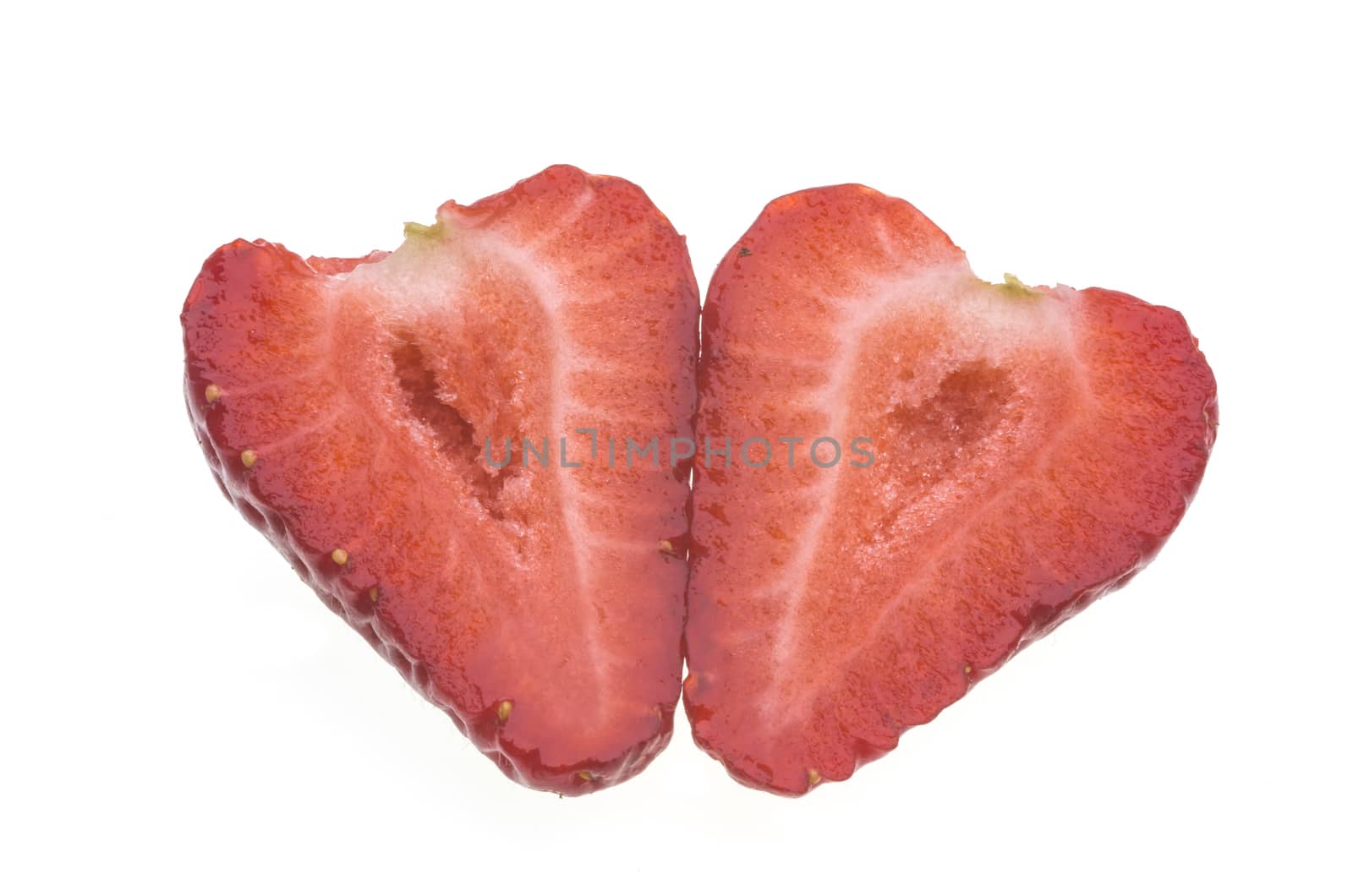 Fresh strawberry cut in half, heart shape