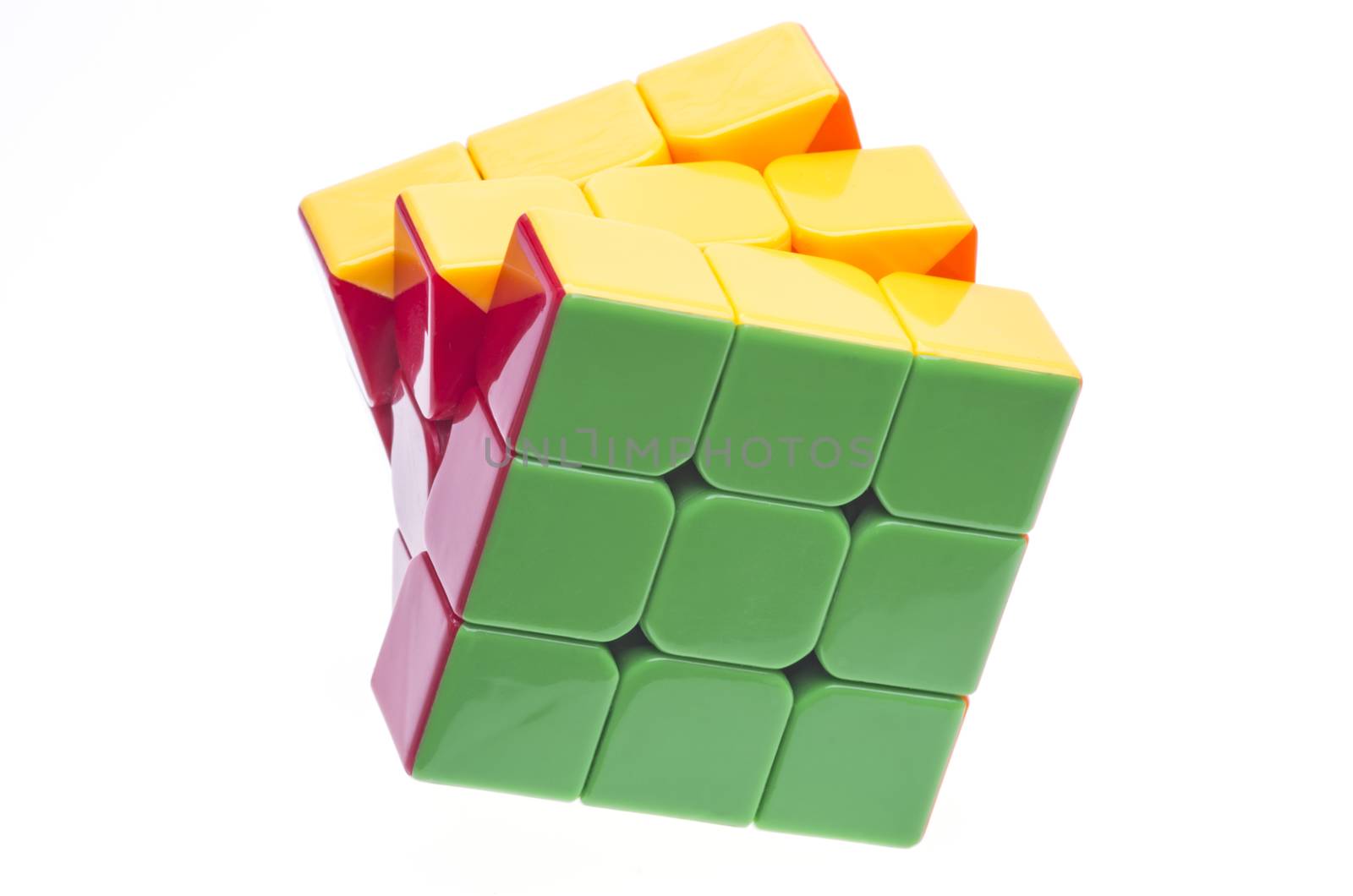 Cloase up image of a Rubik's cube on white.