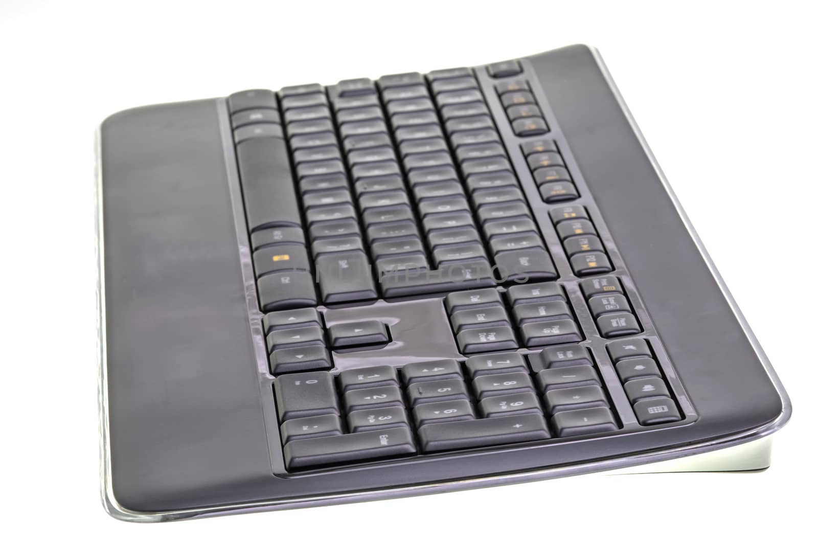 Black wireless keyboard isolated on a white background