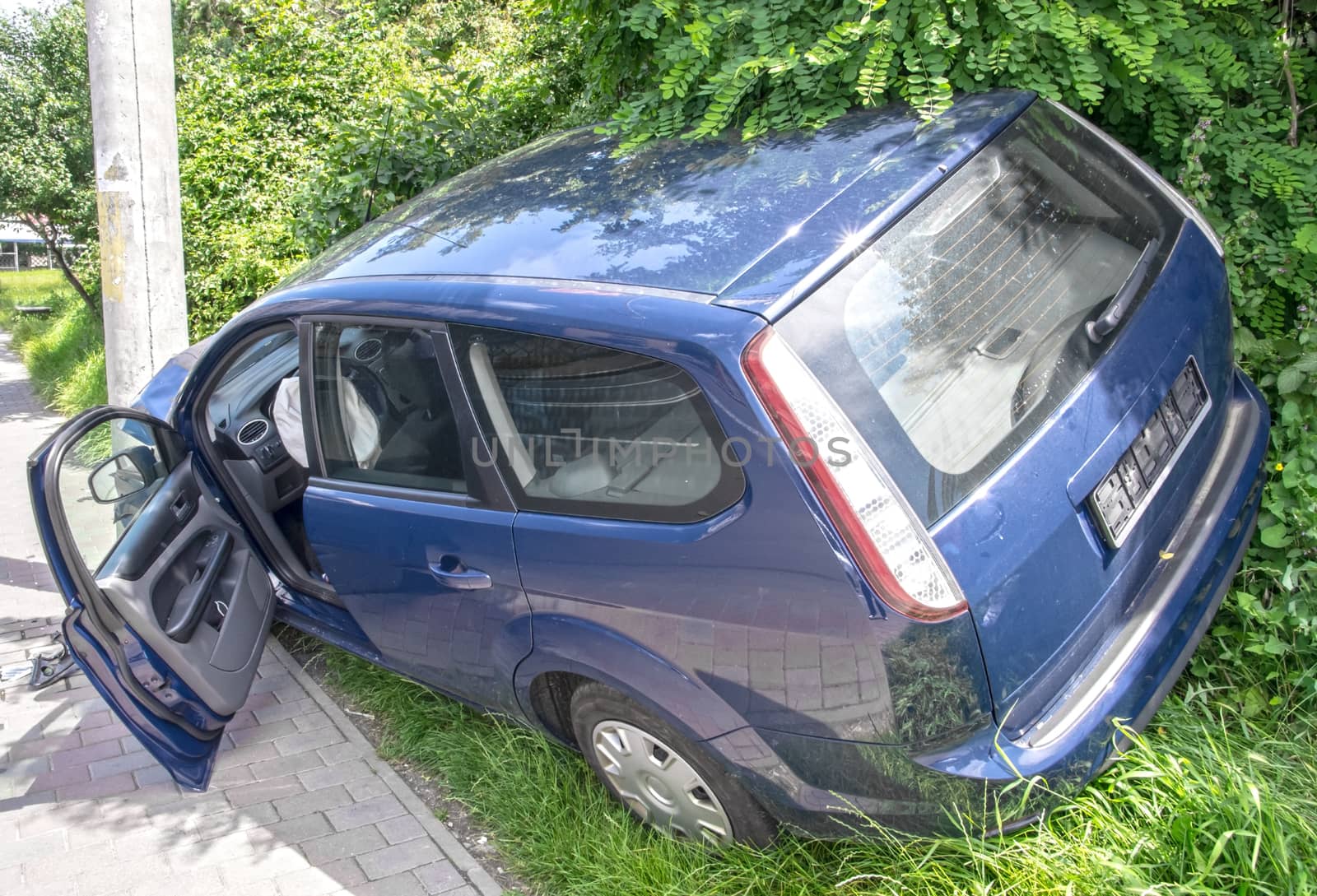 Wrecked car in the city, frontal damage