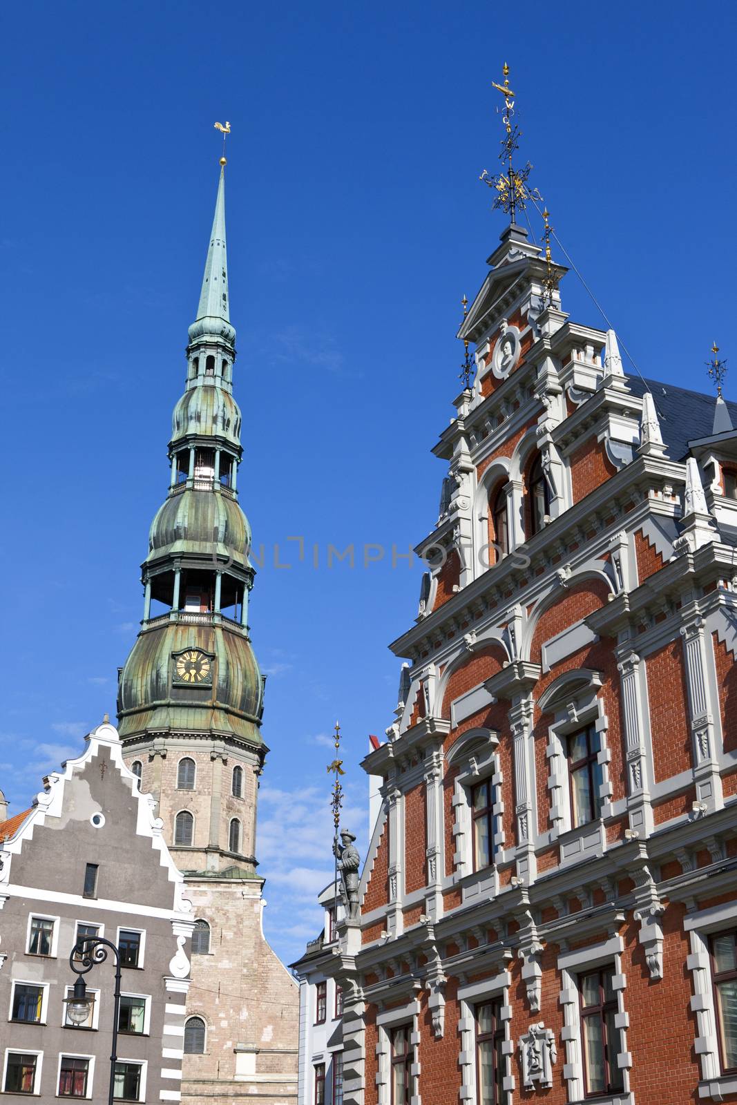 The historic House of the Blackheads and St. Peter's Church in the old town of Riga in Latvia.