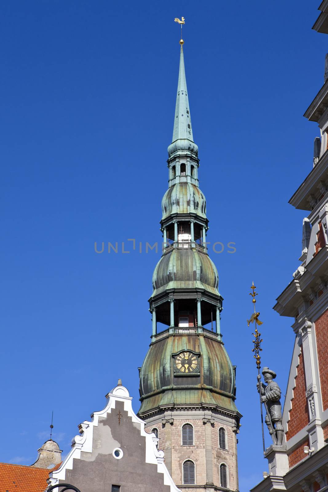 The steeple of the magnificent St. Peter's Church towering over the Old Town in Riga, Latvia.