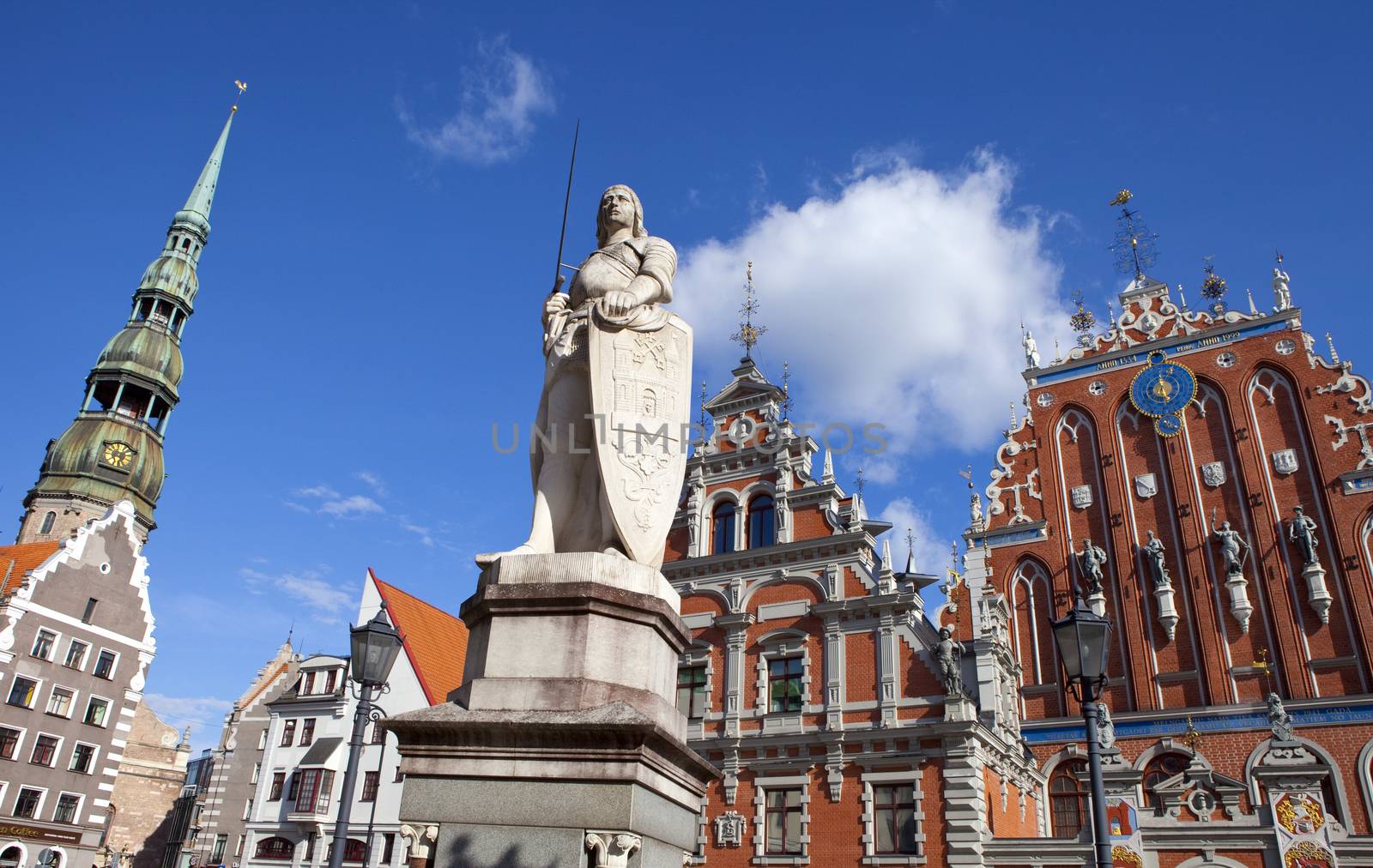 The historic House of the Blackheads, St. Peter's Church and statue of Saint Roland in the old town of Riga in Latvia.