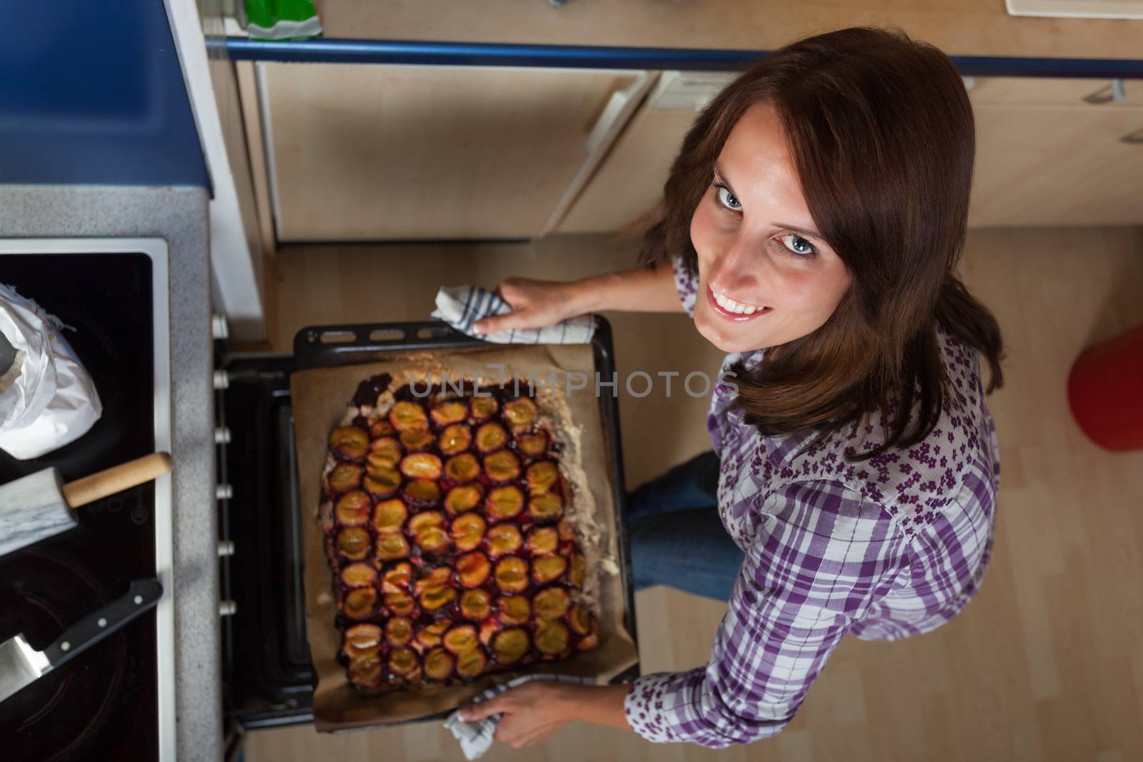woman holding a cake