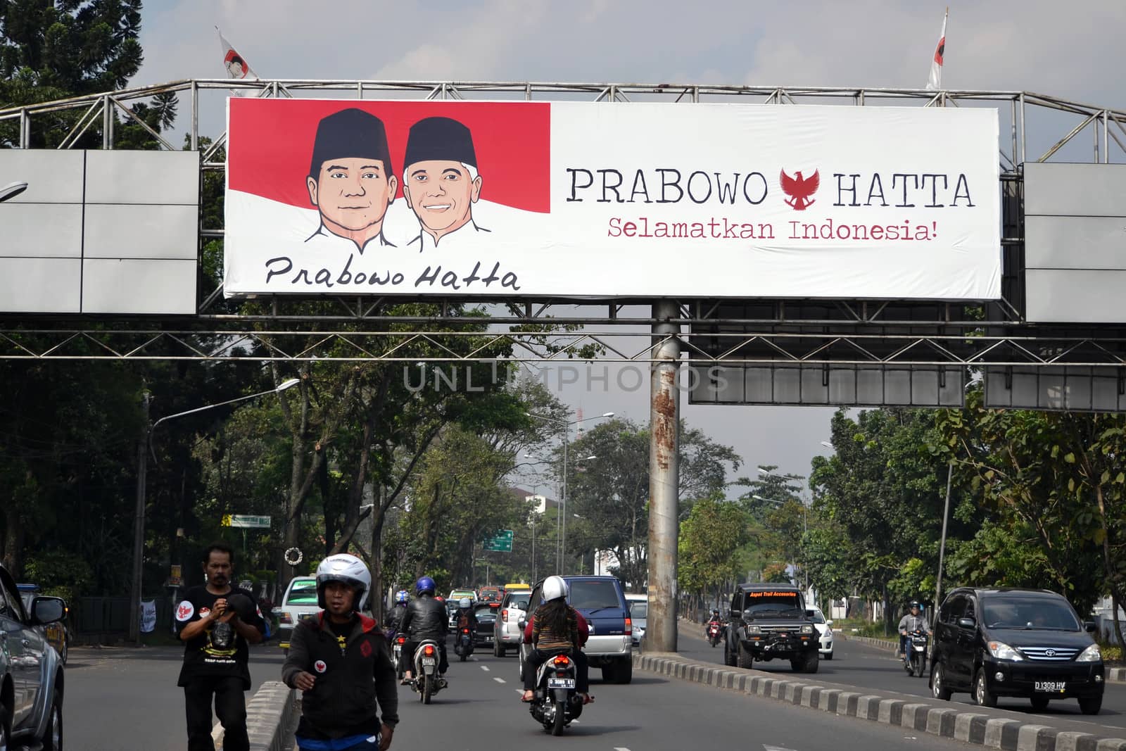 bandung, indonesia-july 3, 2014: prabowo hatta rajasa political billboard shown for indonesian election 2014.
