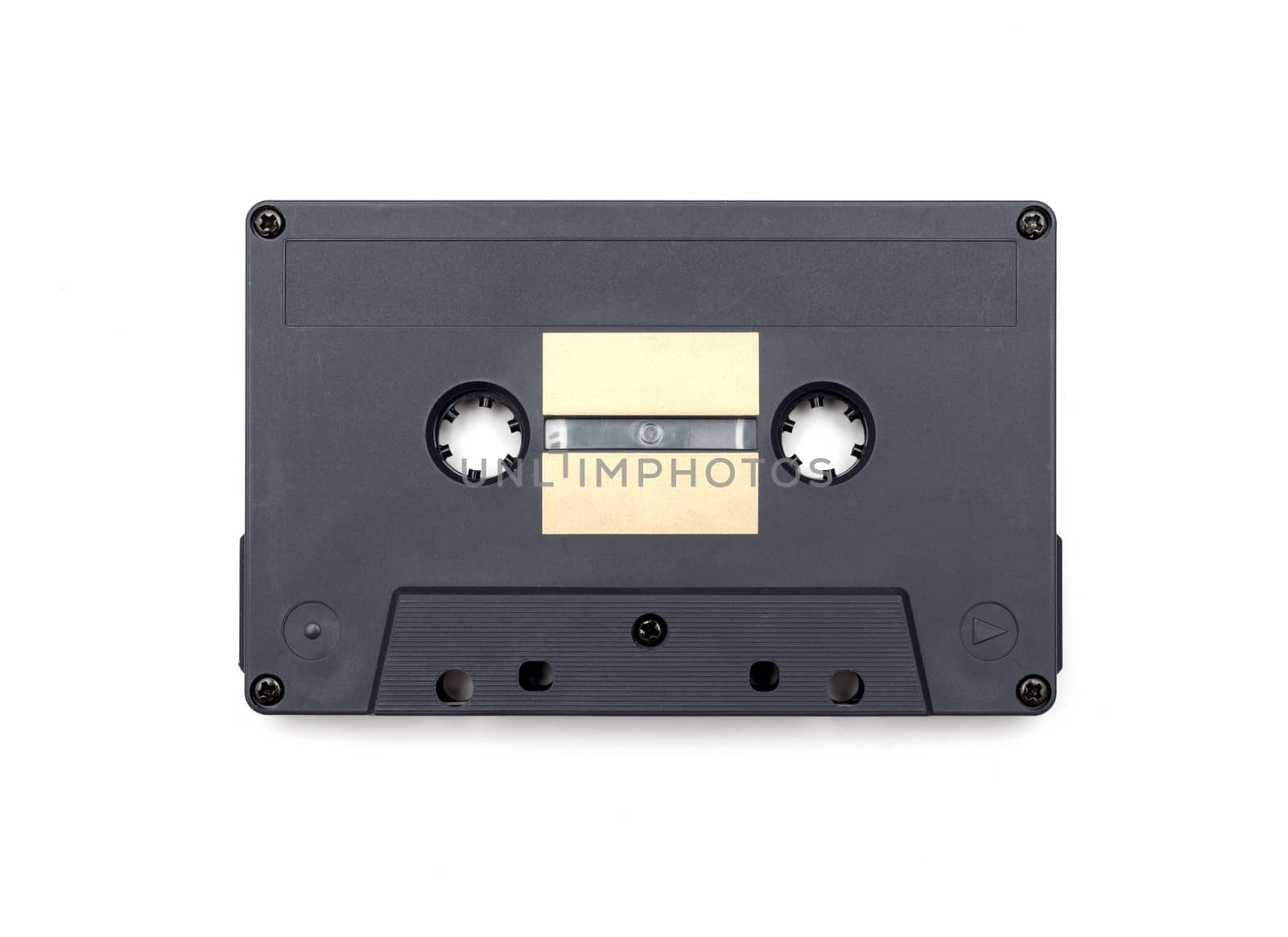 close up of vintage audio tape on white background