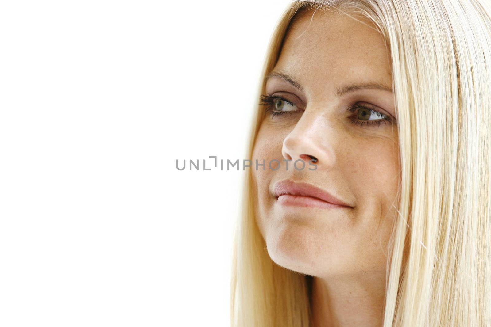 Blond beautiful woman face close-up with natural make-up