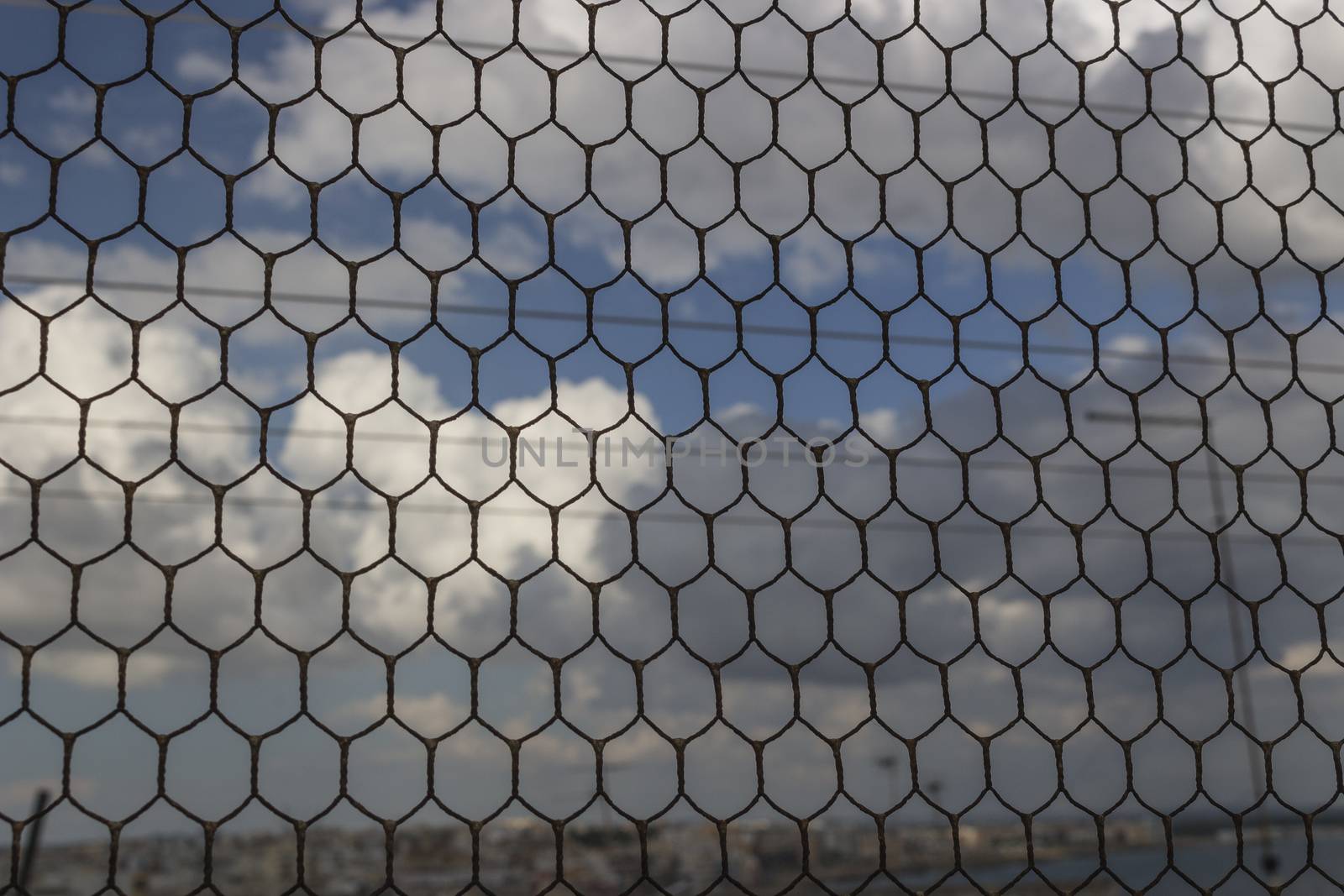 Rusty old wire netting on the roof of Doxi Stracca Fontana Palace about 1760 A.D. in the old town of Gallipoli (Le)) in the southern Italy