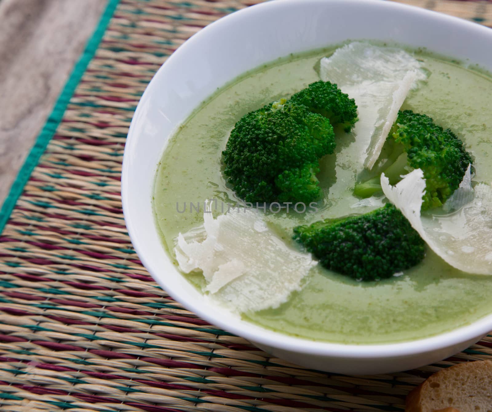 Broccoli cream soup with parmesan by tolikoff_photography