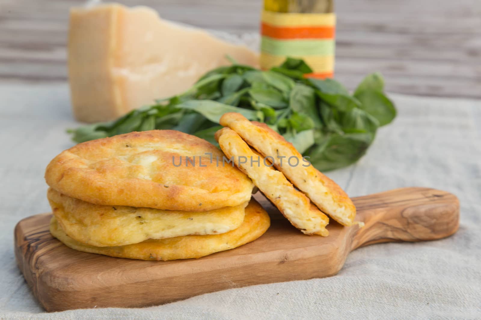 Salty pancakes with olive oil and parmesan baked in the stove
