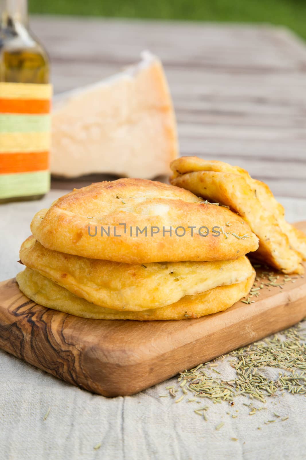 Salty cottage cheese pancakes with dried rosemary by tolikoff_photography