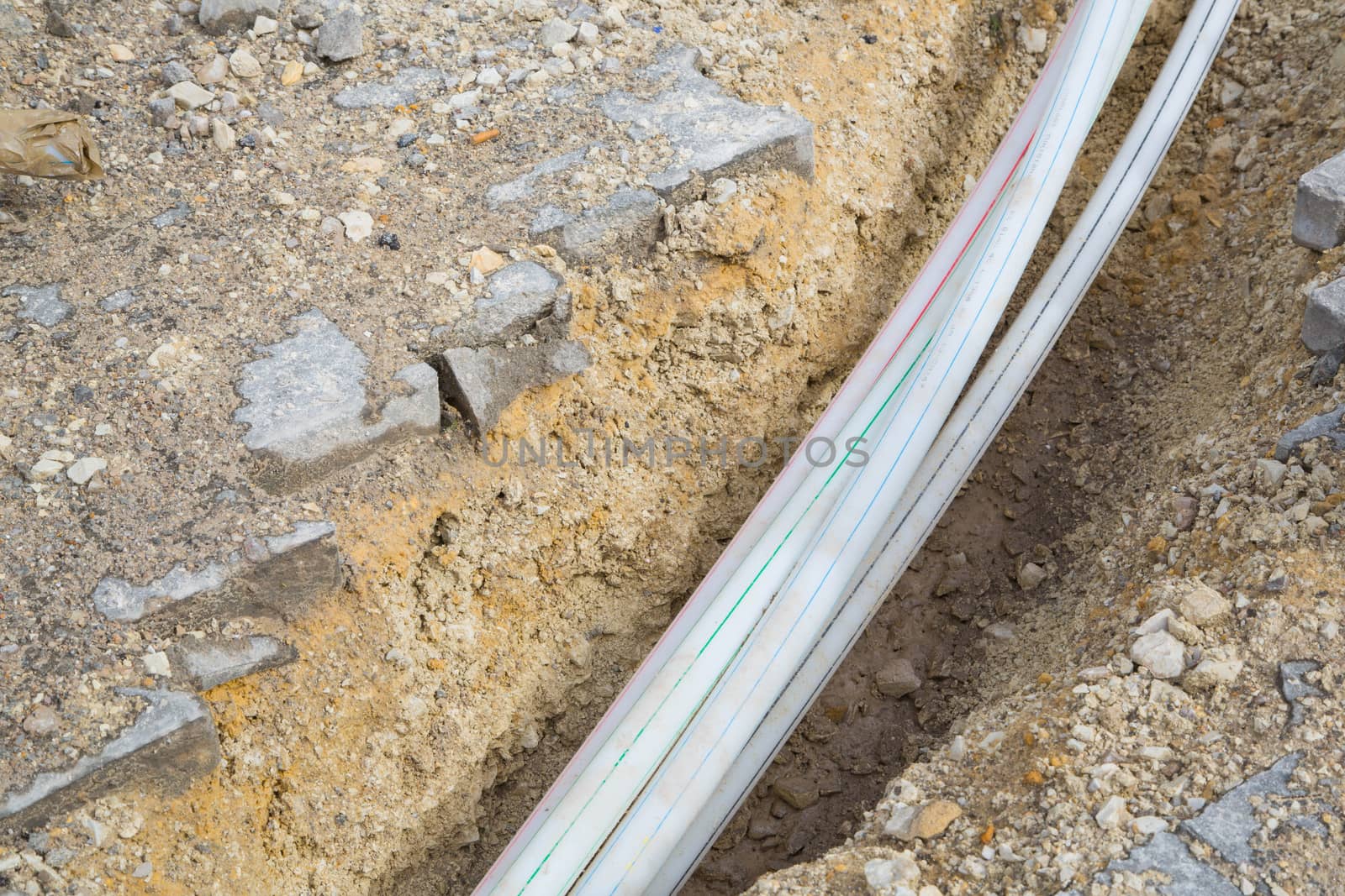 Four new white pipes in the ground 