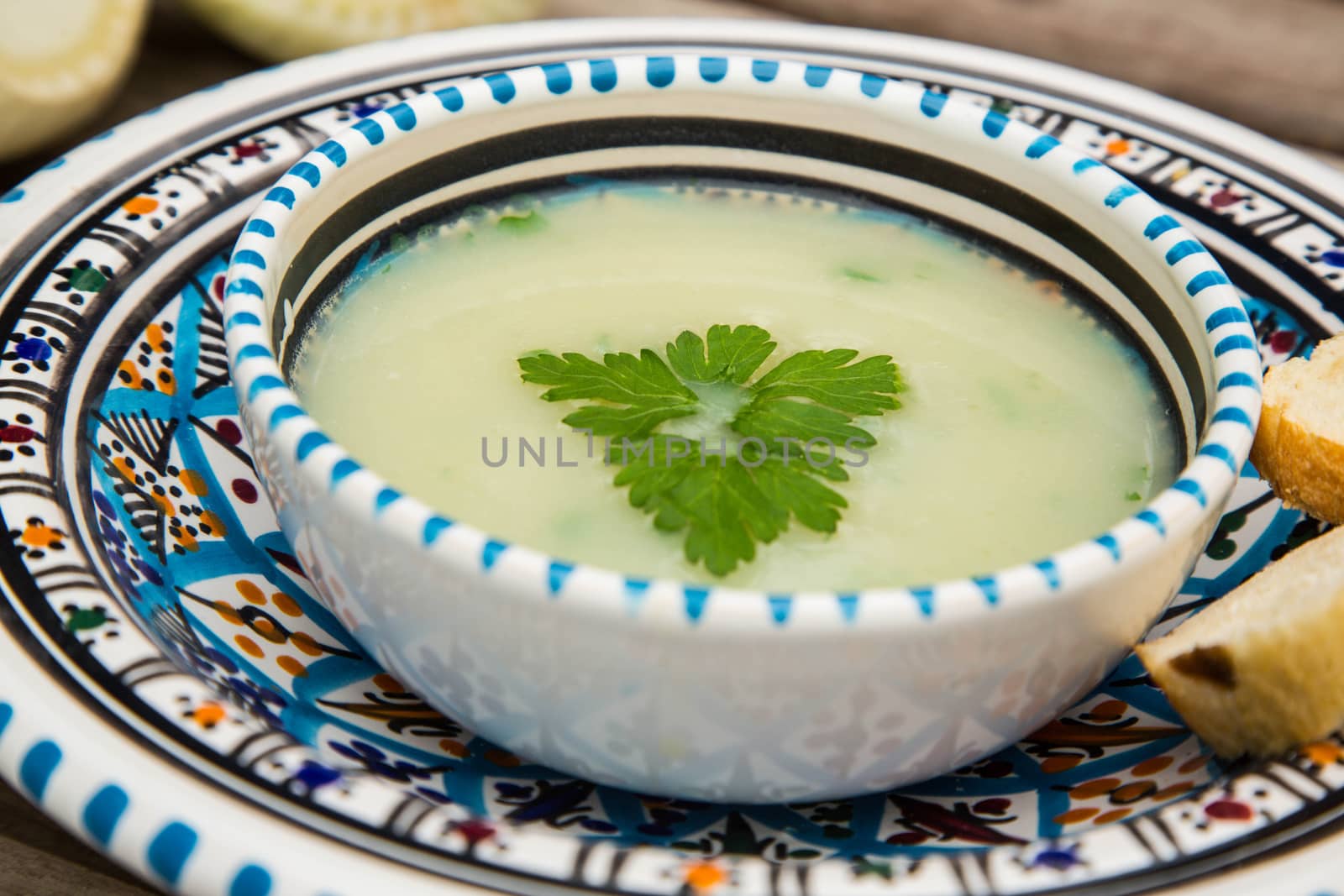 Fennel cream soup in the traditional tunisian plate
