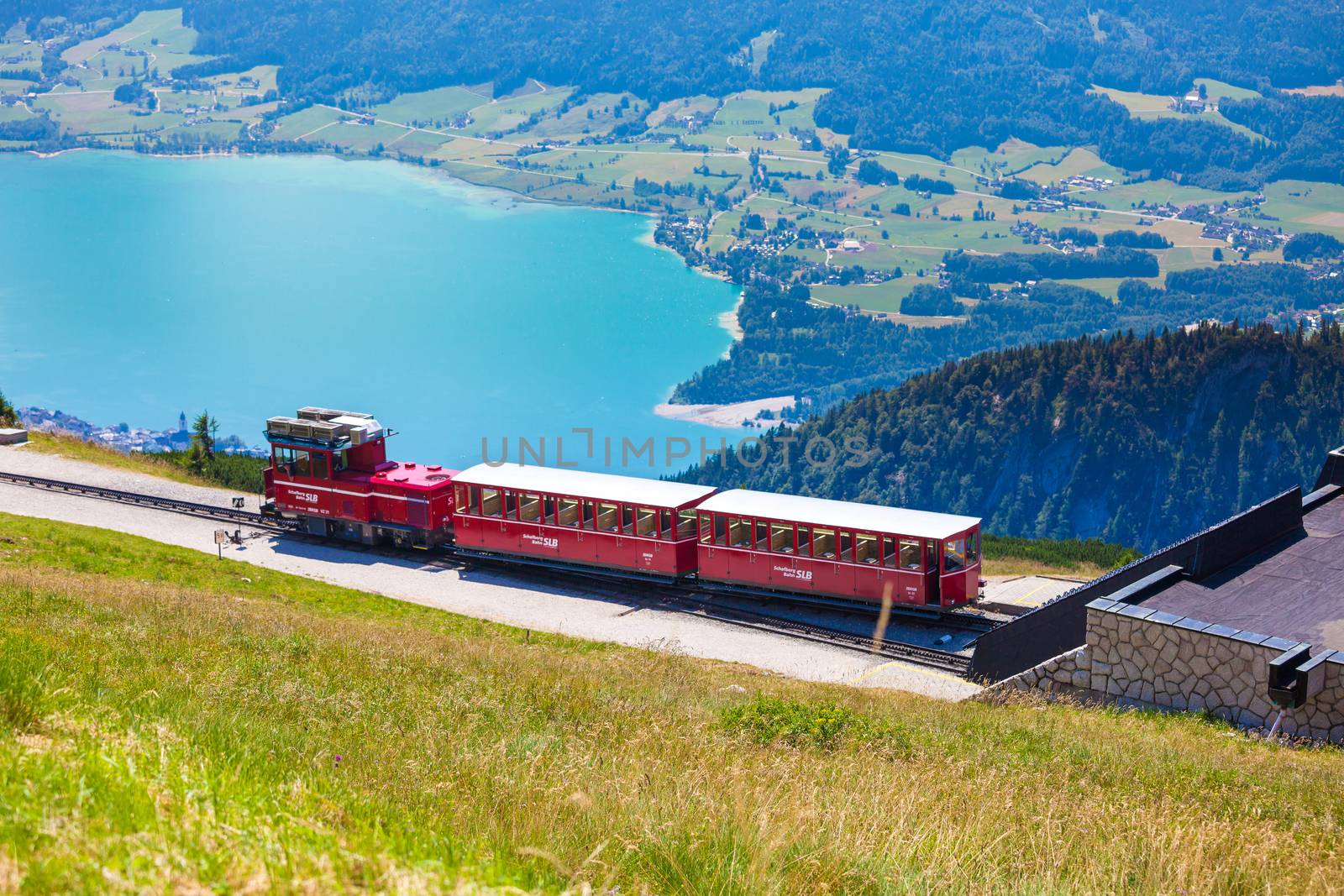 ST. WOLFGANG, AUSTRIA - AUGUST 6: Diesel train railway going to Schafberg Peak (1783m) on August 6, 2013 in St. Wolfgang.