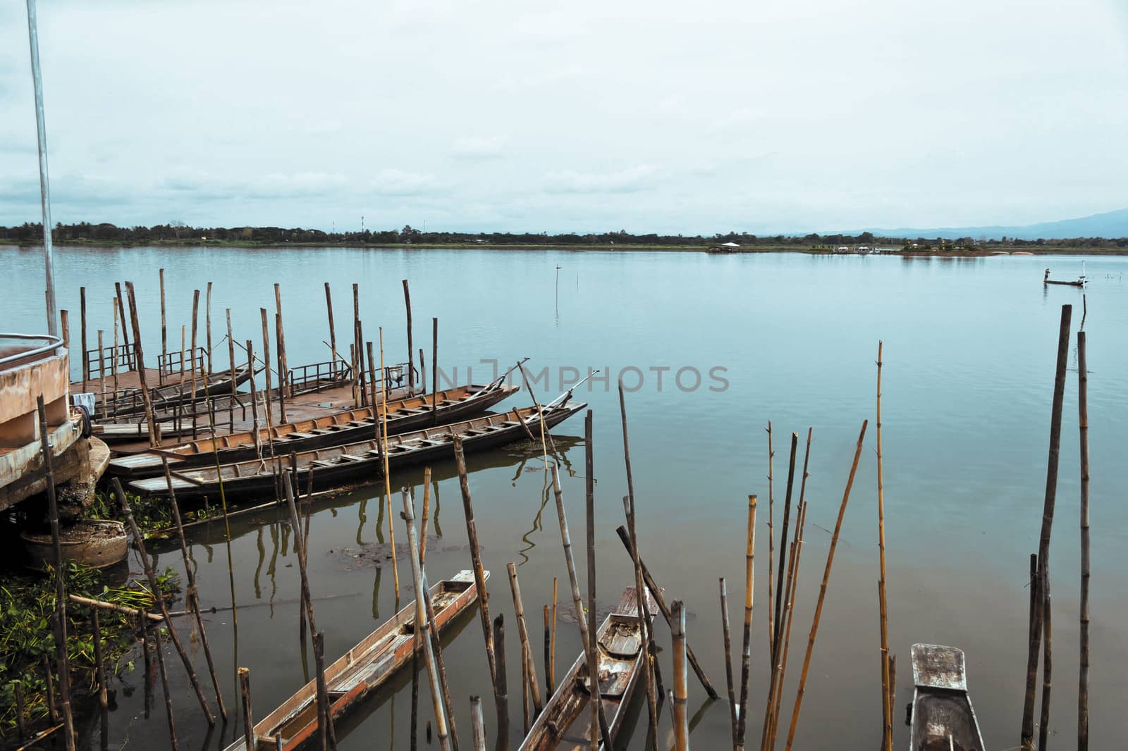 Old dock by the lake of the National Park by sutipp11