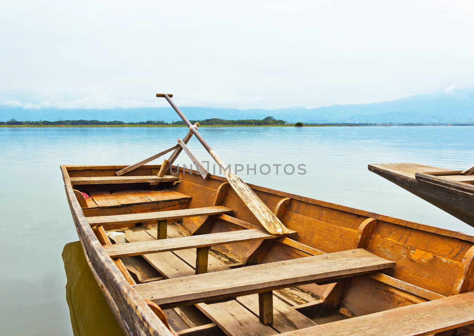 Antique wooden boat ferries transport people up to 6 people