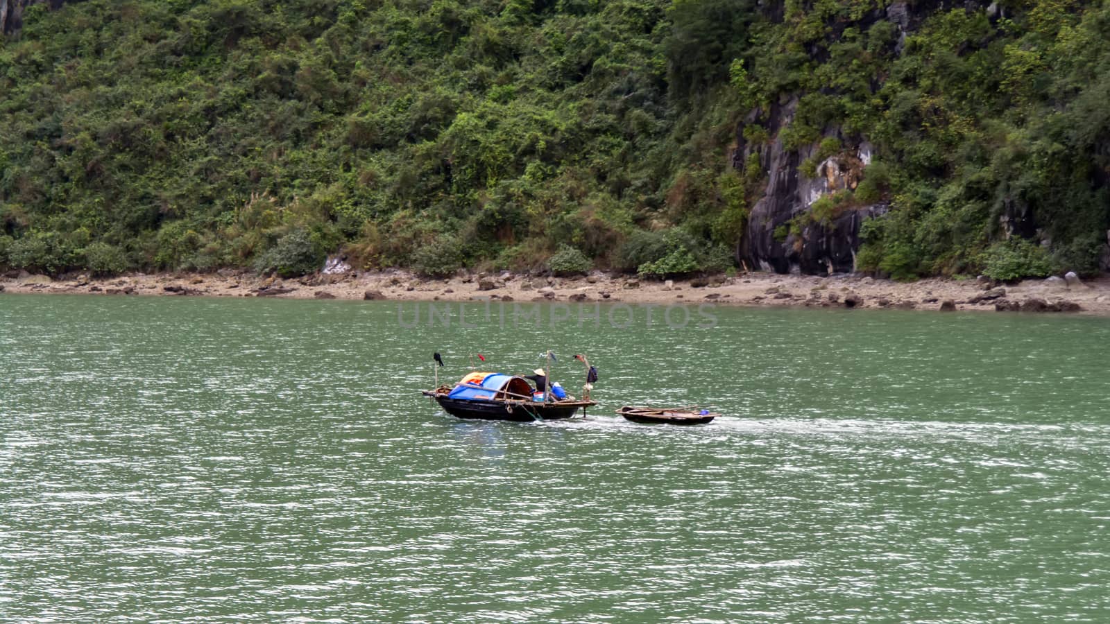 Fishermen Family in Ha Long Bay, Vietnam. 