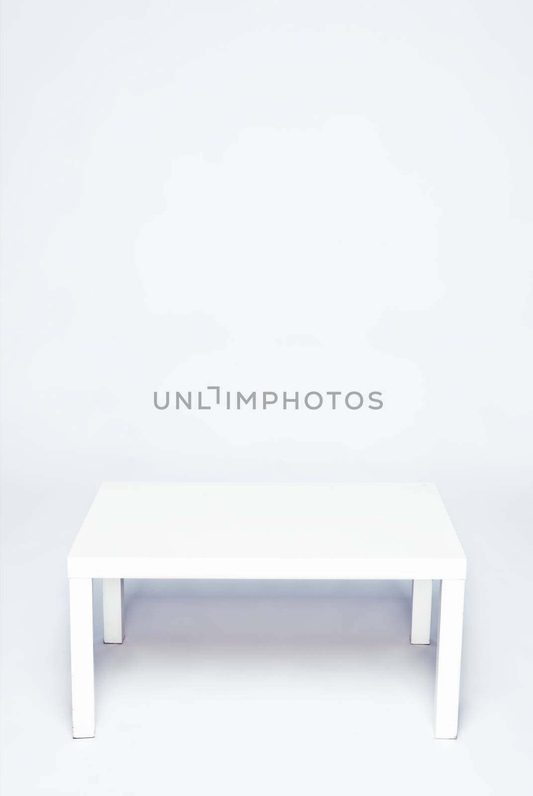 white table on a white background. photo
