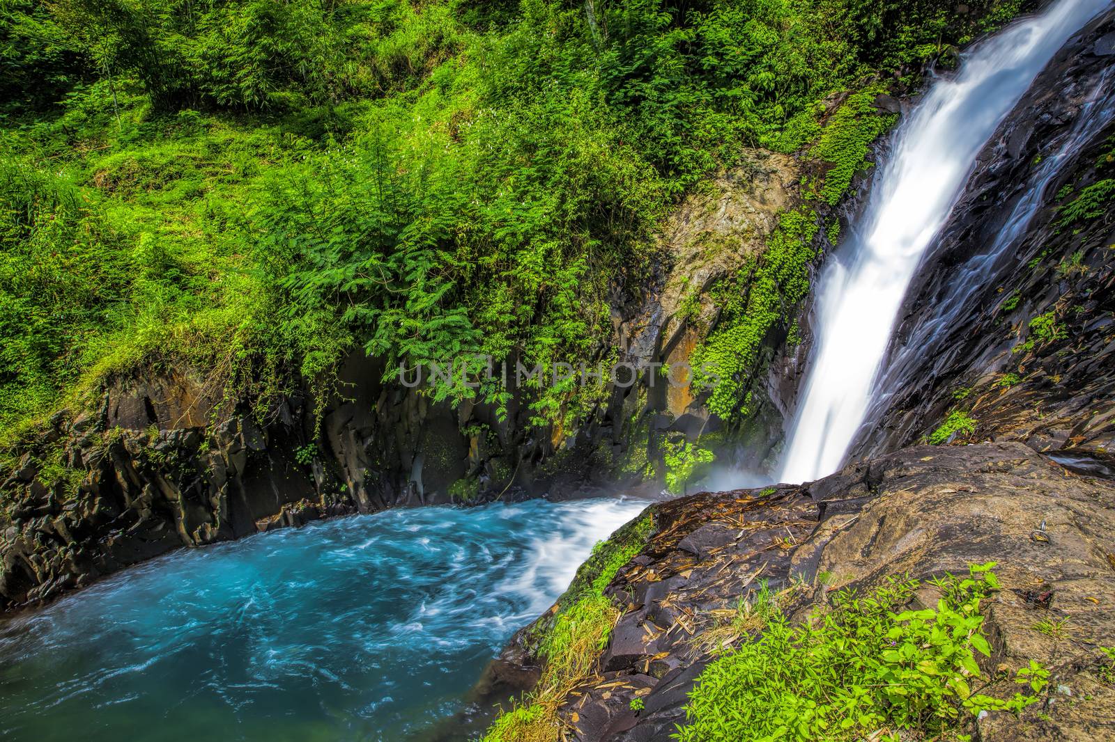 One of the Gitgit waterfalls in Northern Bali, Indonesia
