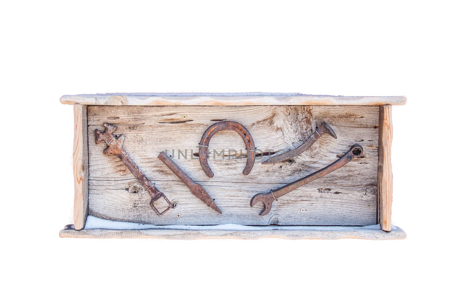 Old tools framed in red wood