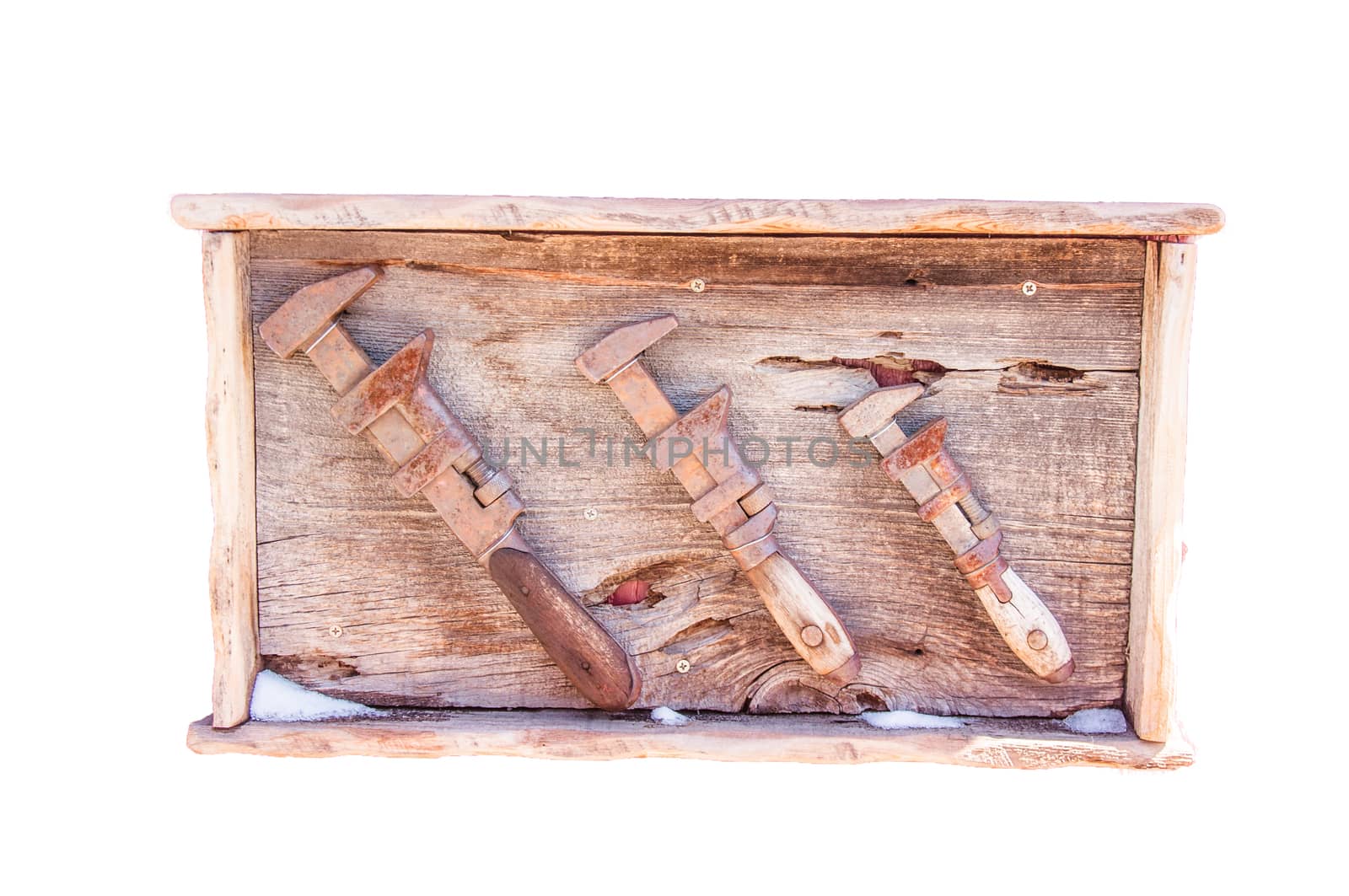 Old tools framed in red wood