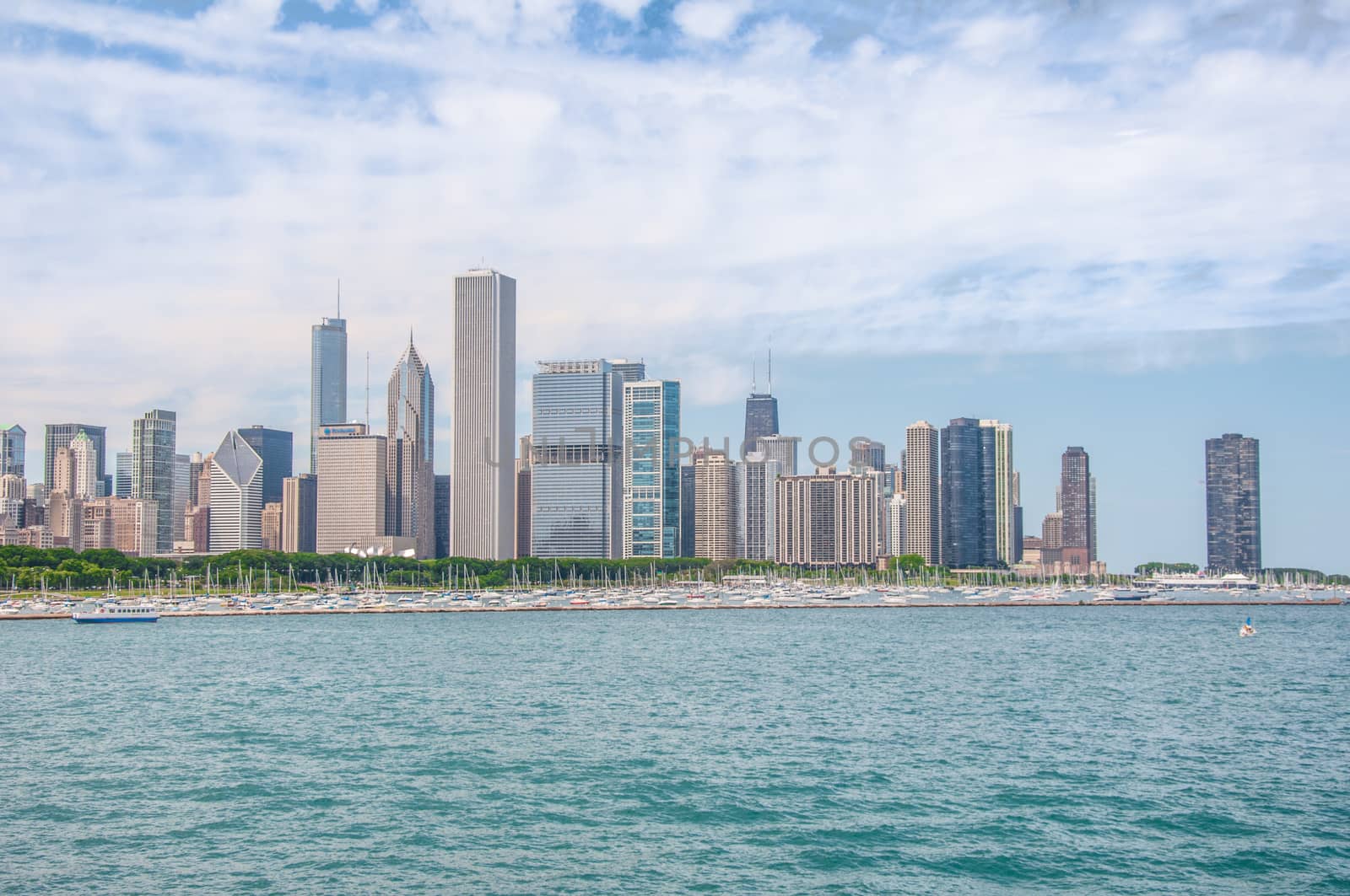 Downtown Chicago buildings viewed from the lake during sundown