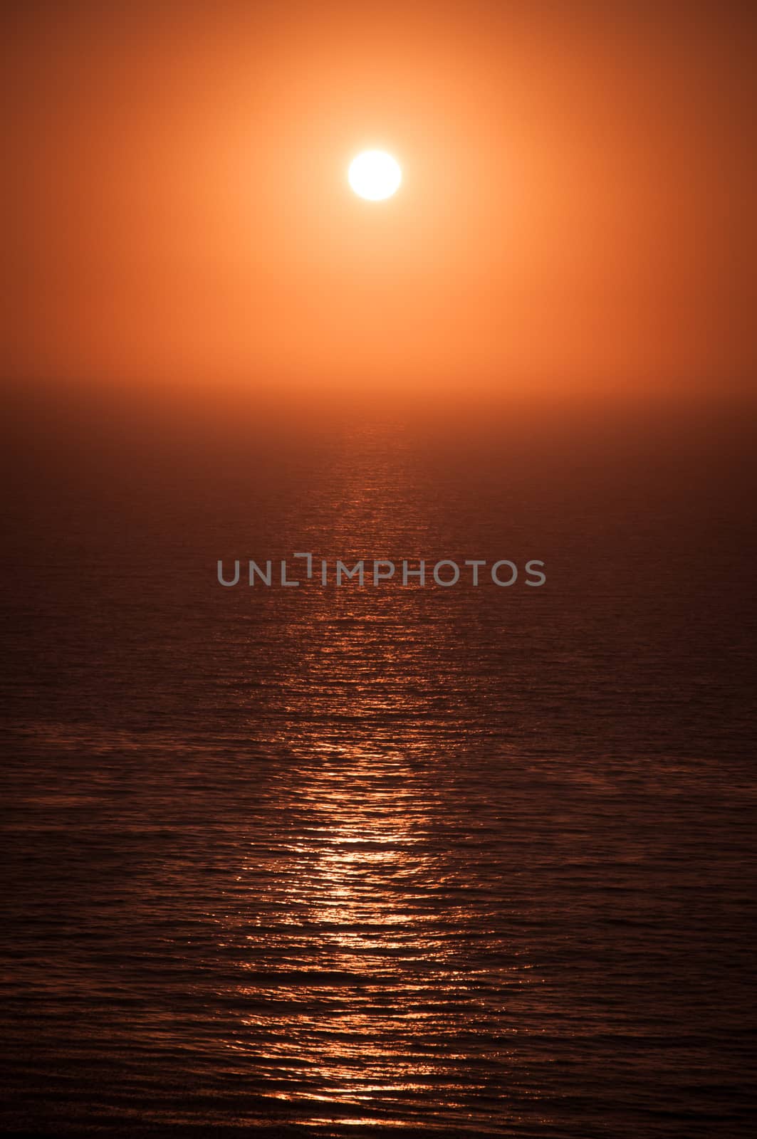 Beautiful golden sunset over the ocean tidal waters