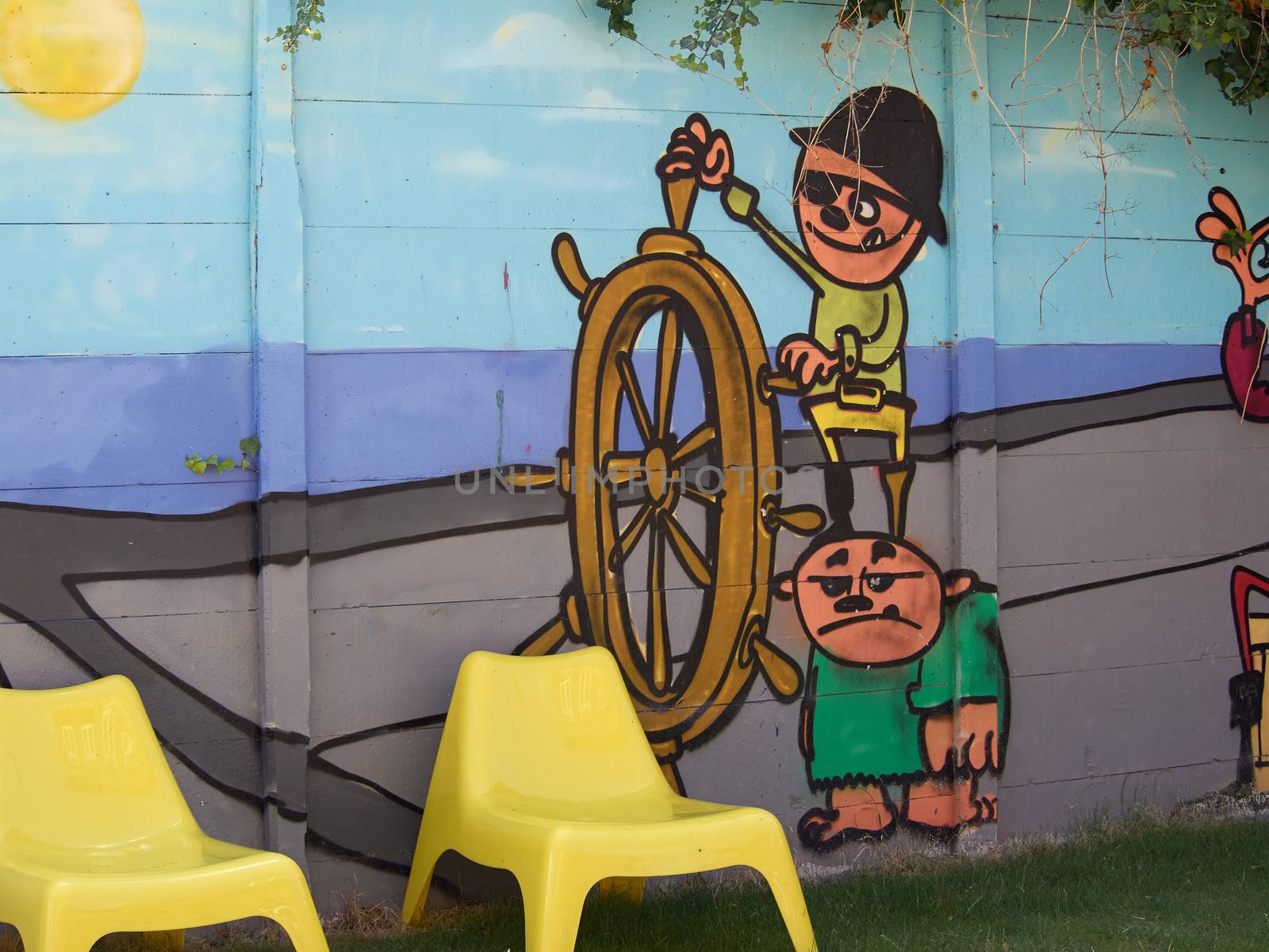 Funny colorful creative graffiti on a wall  