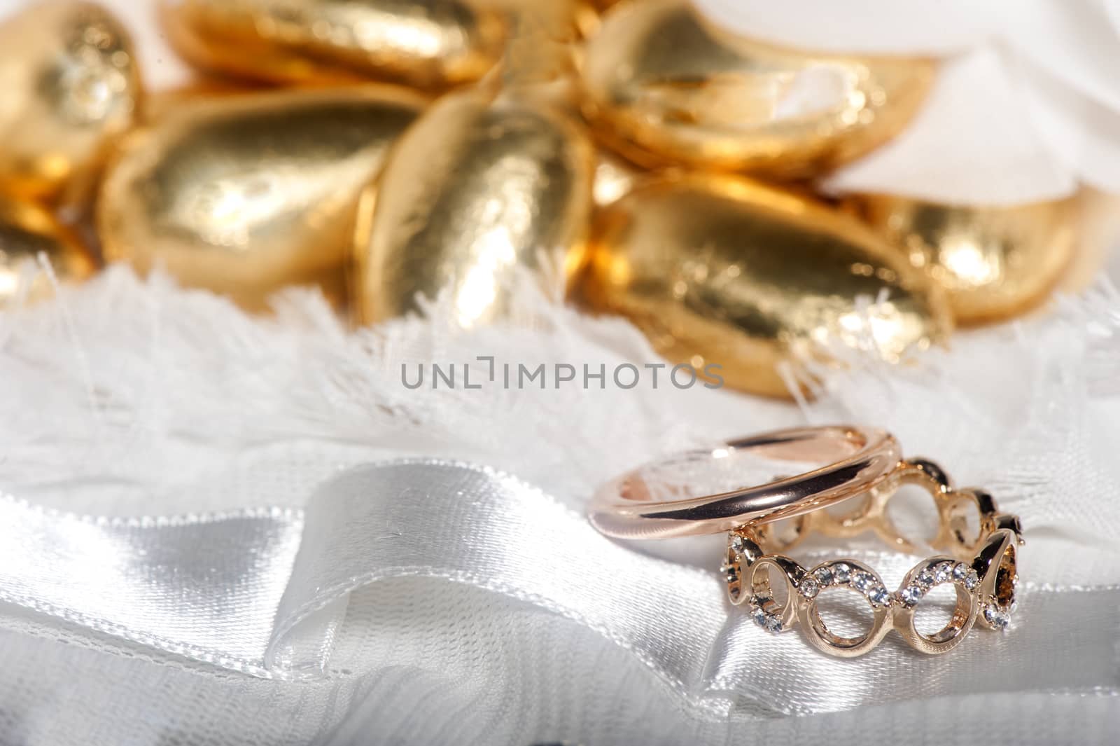  wedding rings on colorful fabric  by carla720