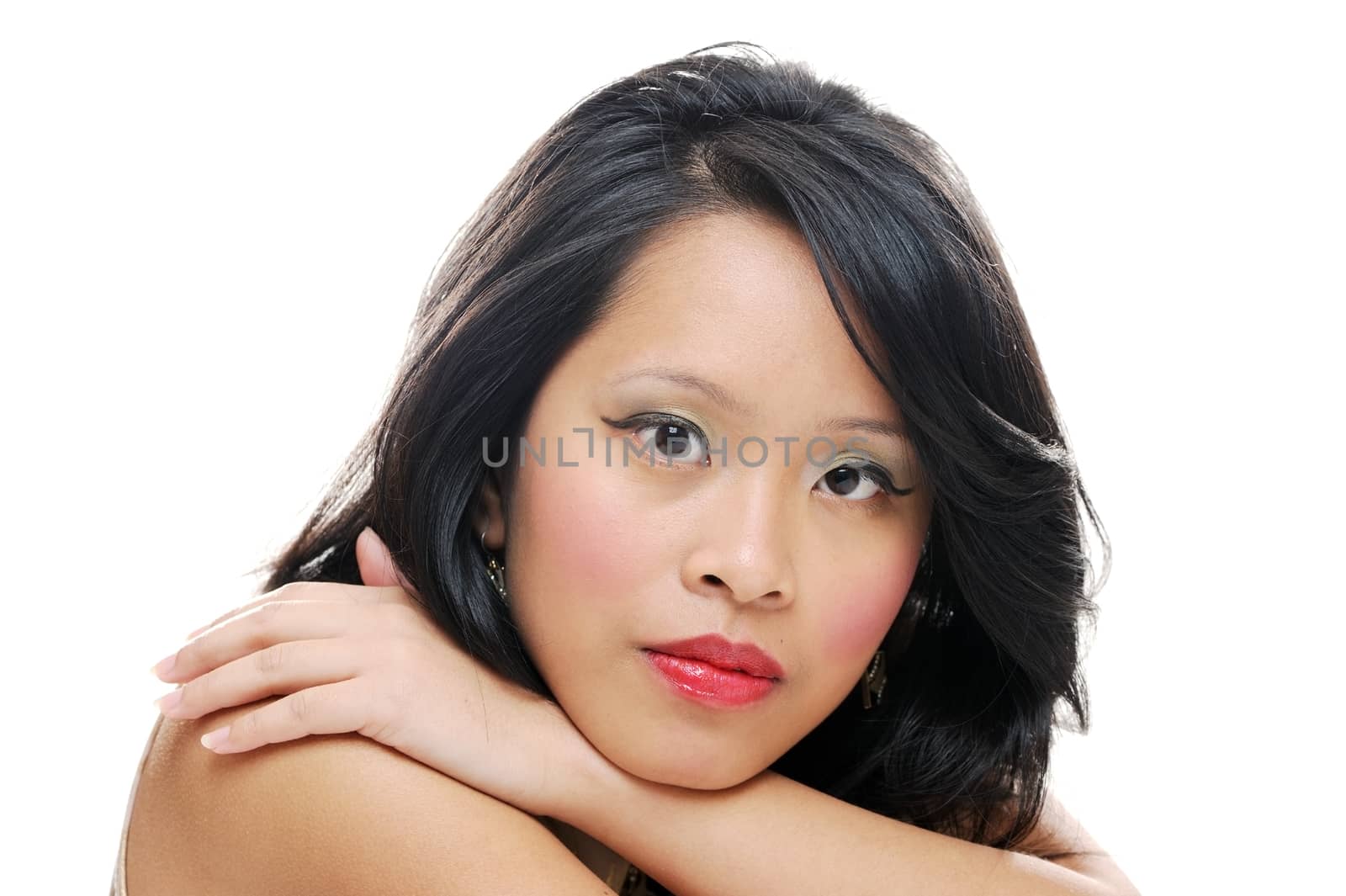 Asian girl looking serious in closeup portrait