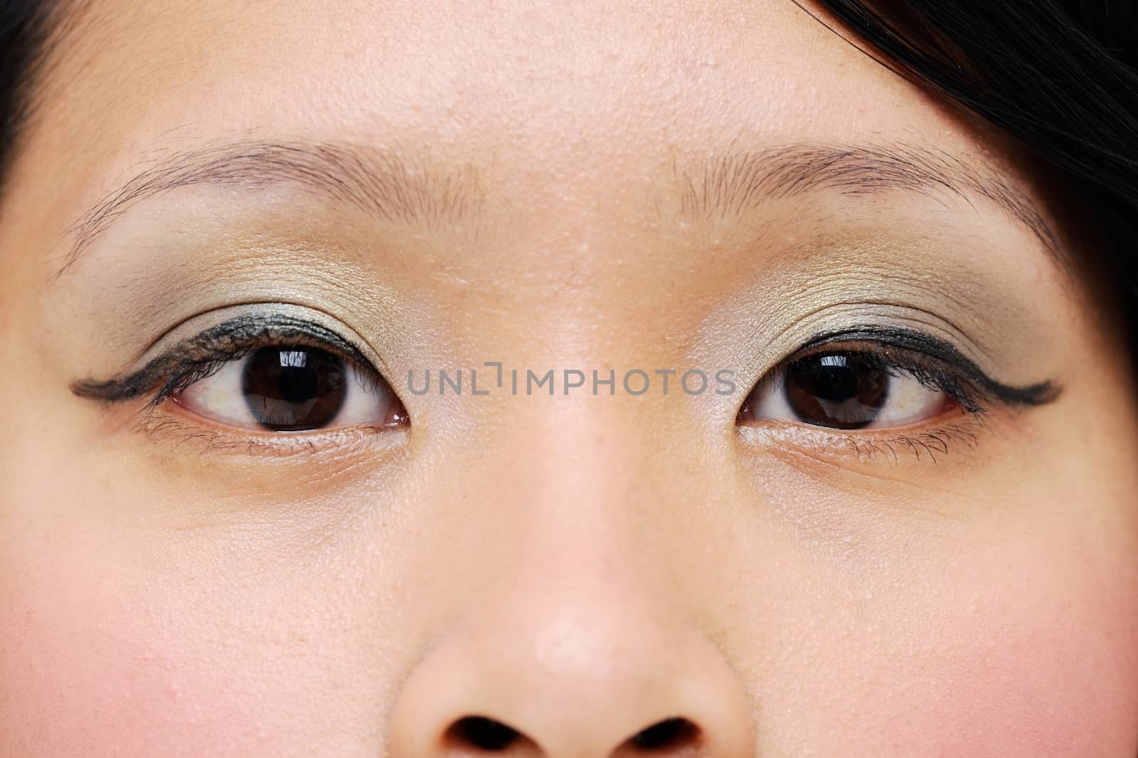 Asian girls eyes closeup with makeup