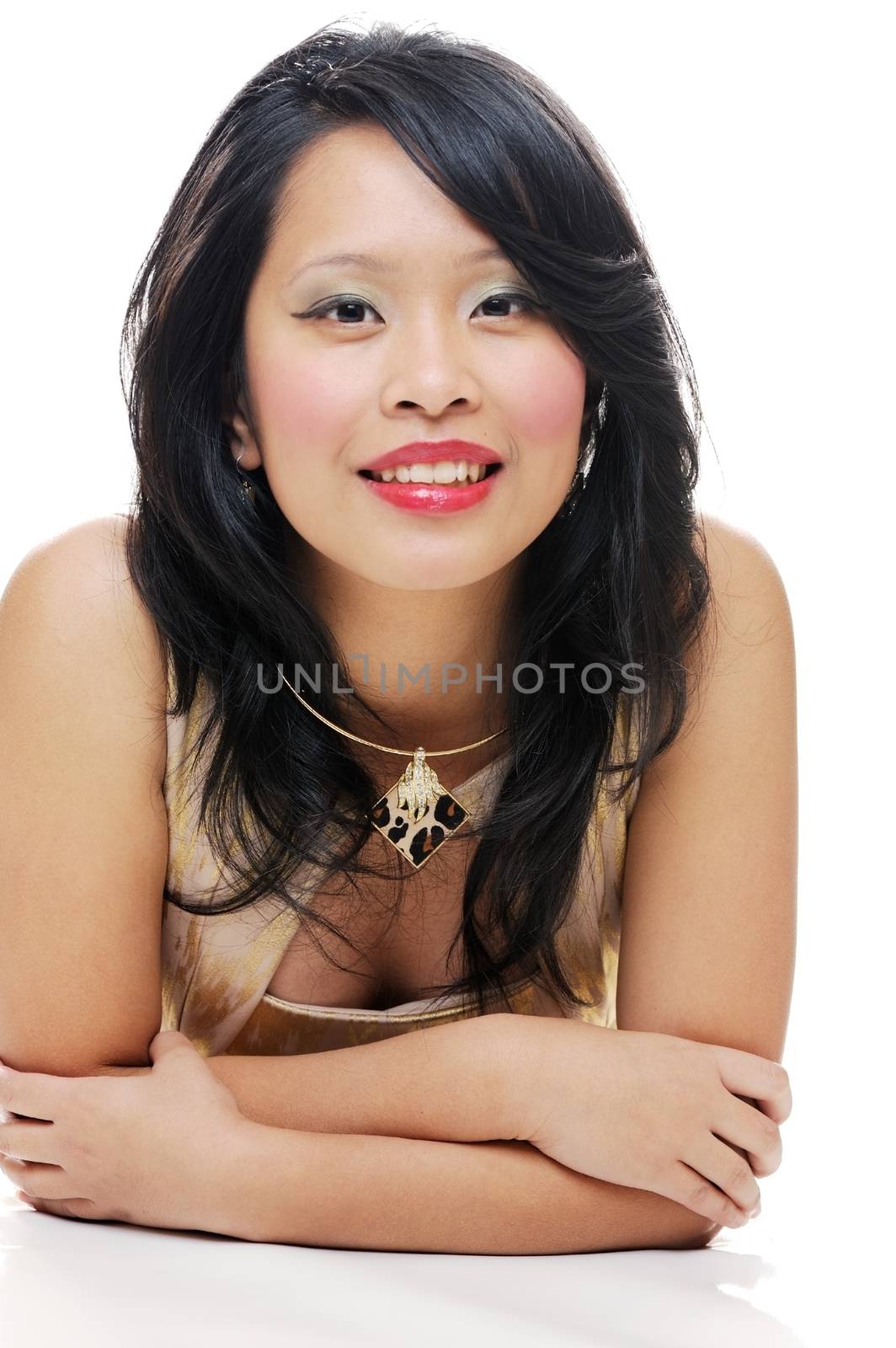 Asian lady smiling and looking happy with makeup