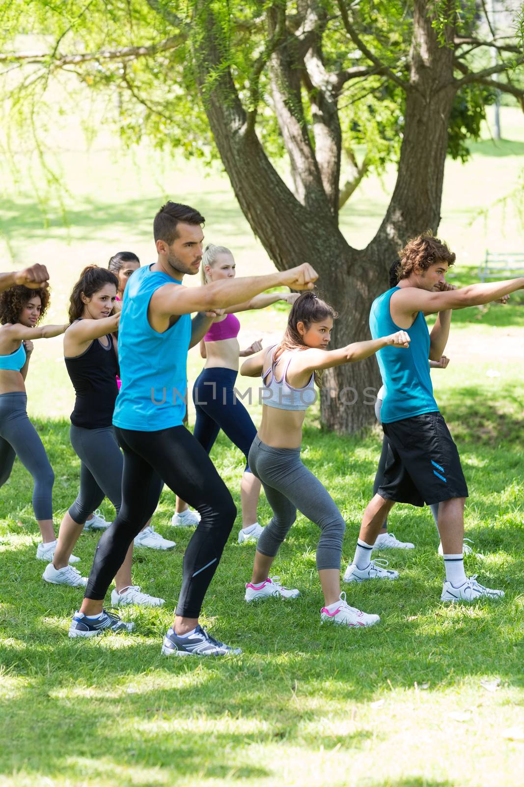 Group of multiethnic people exercising in the park