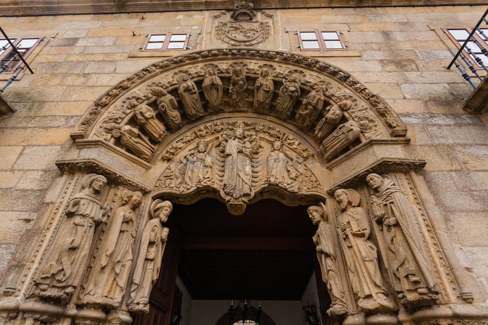 Carved romanesque door entrance to the san Xerome building in Santiago de Compostela, Spain