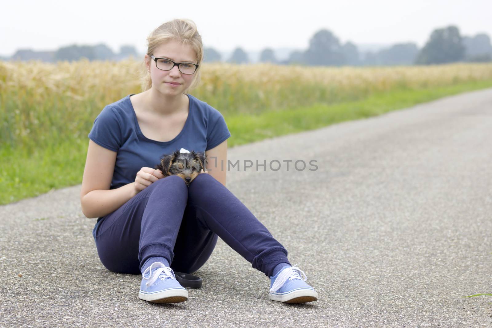 young girl and her dog by miradrozdowski