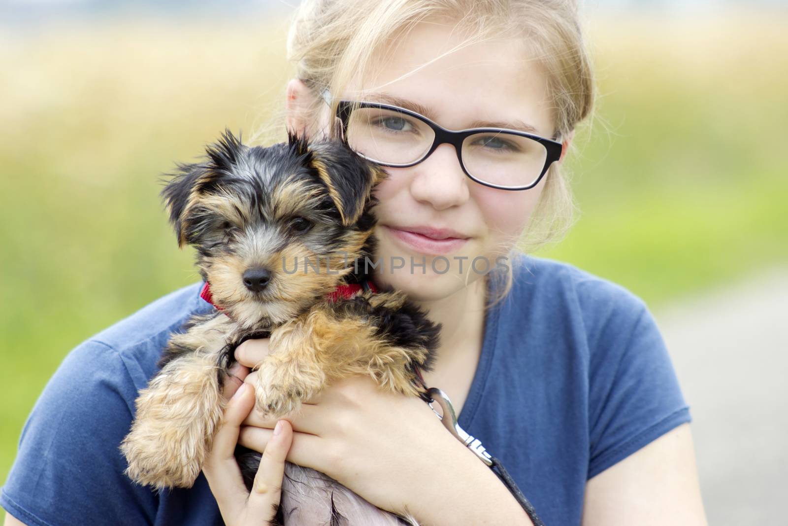 young girl and her dog by miradrozdowski