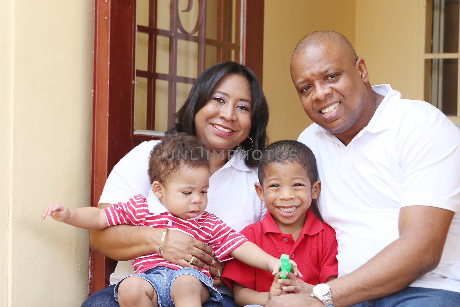 Happy african family in their new house.