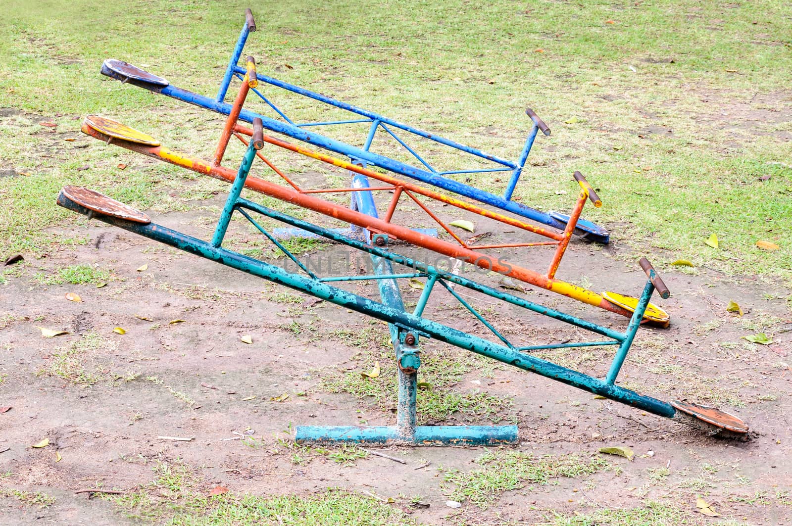 Old seesaw board on the playground