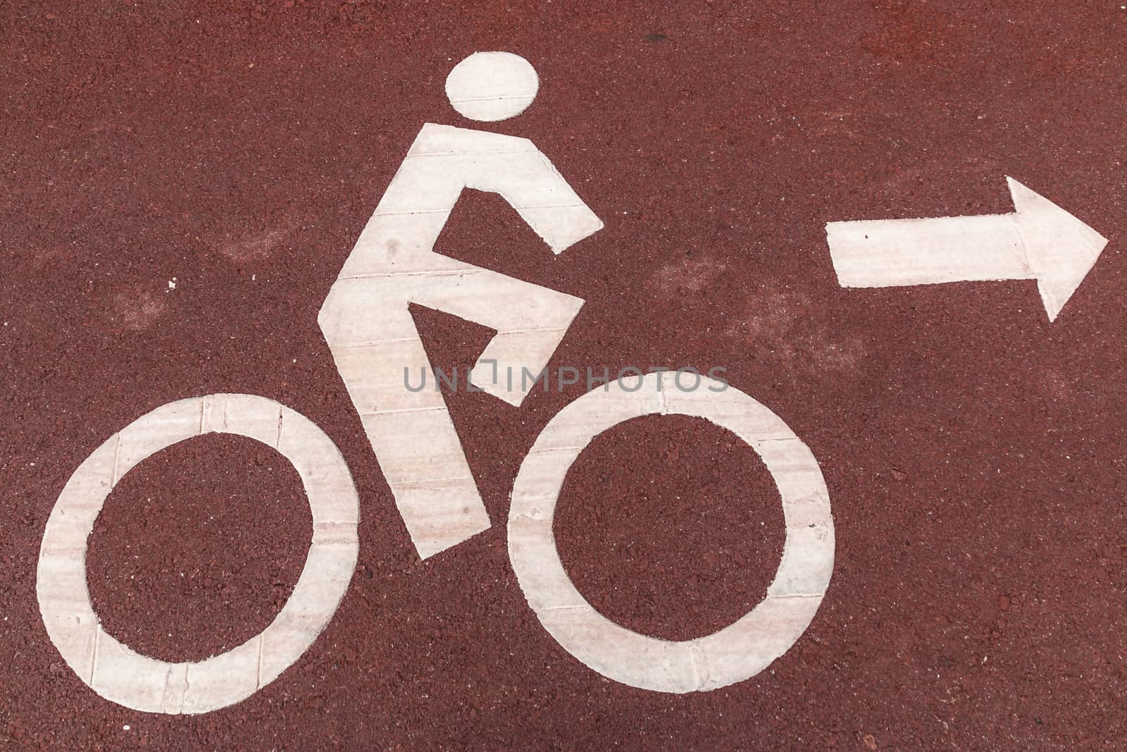 Cyclists symbol sign painted on the pavement.