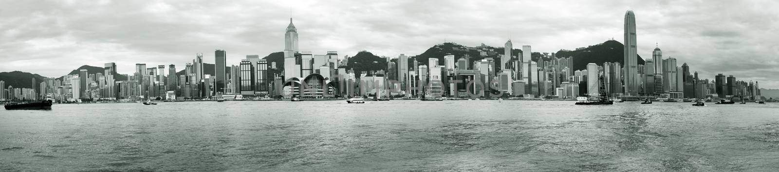 HONG KONG - APRIL 26:  Panorama of 10 frames. View of modern skyscrapers in downtown Hong Kong on sunset, China on April 26, 2014. 