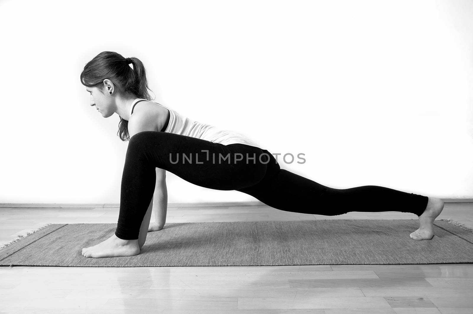 Young girl doing yoga pose