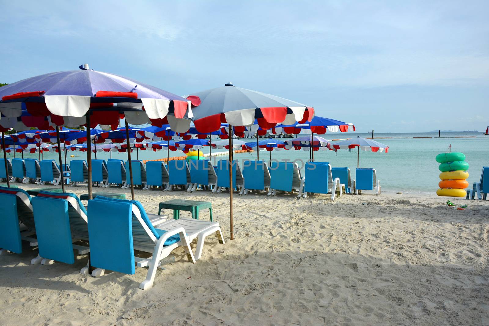 beach chairs and umbrella at Koh Larn, Pataya,Thailand