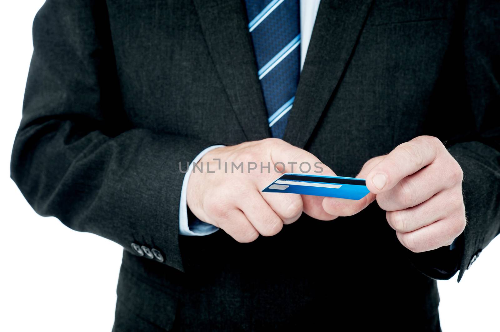 Cropped image of businessman checking his credit card