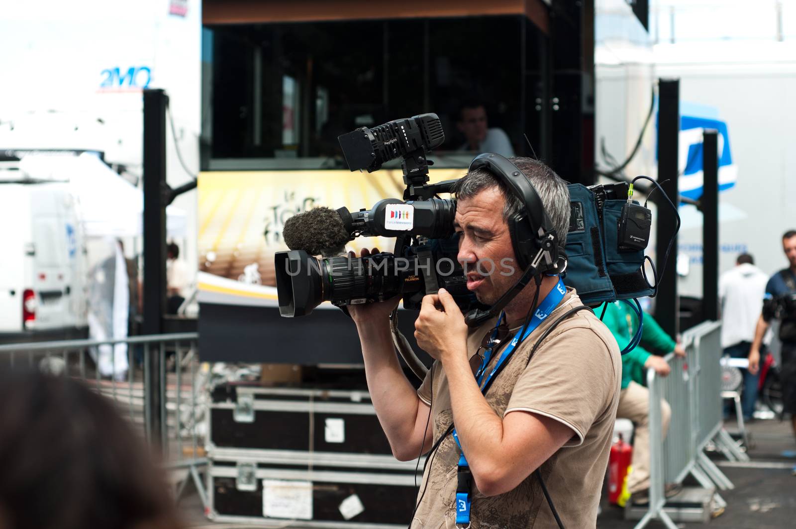 MULHOUSE - FRANCE - 13 th July 2014 - tour de France - cameraman by NeydtStock