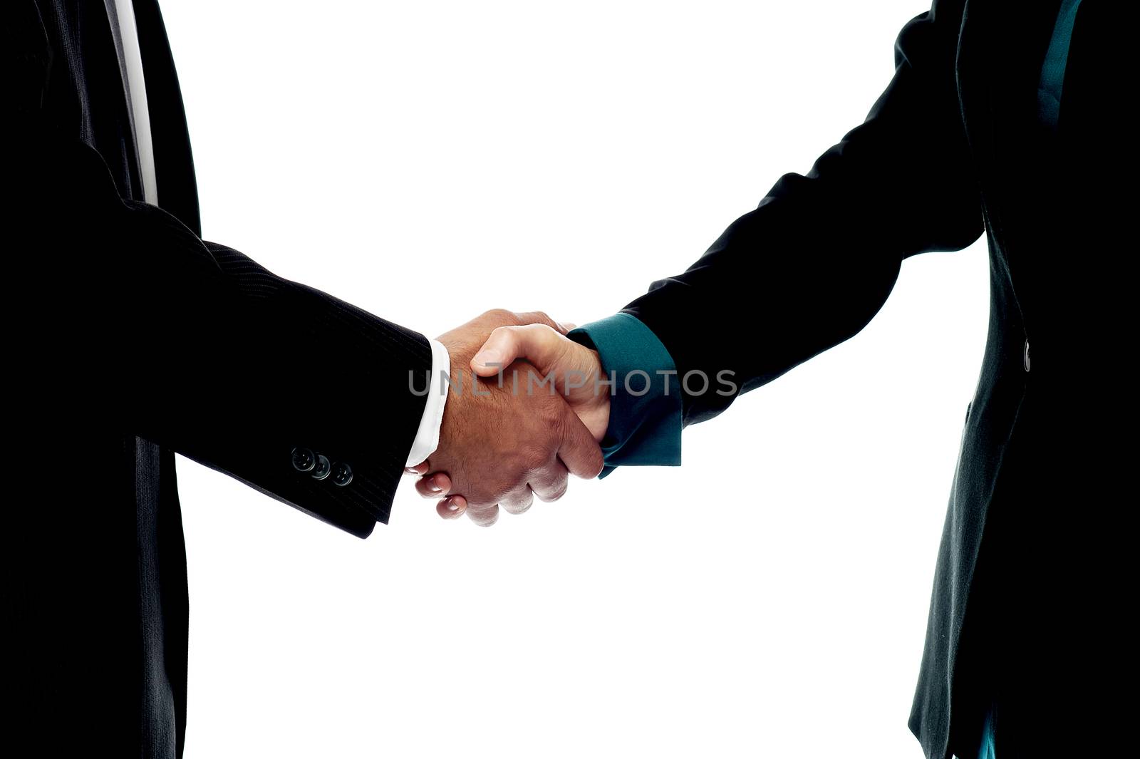 Business people handshake by stockyimages