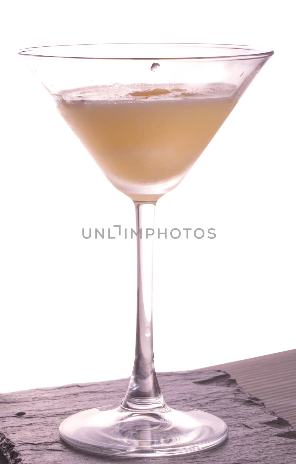 Sorbetto in a cocktail glass isolated over white background