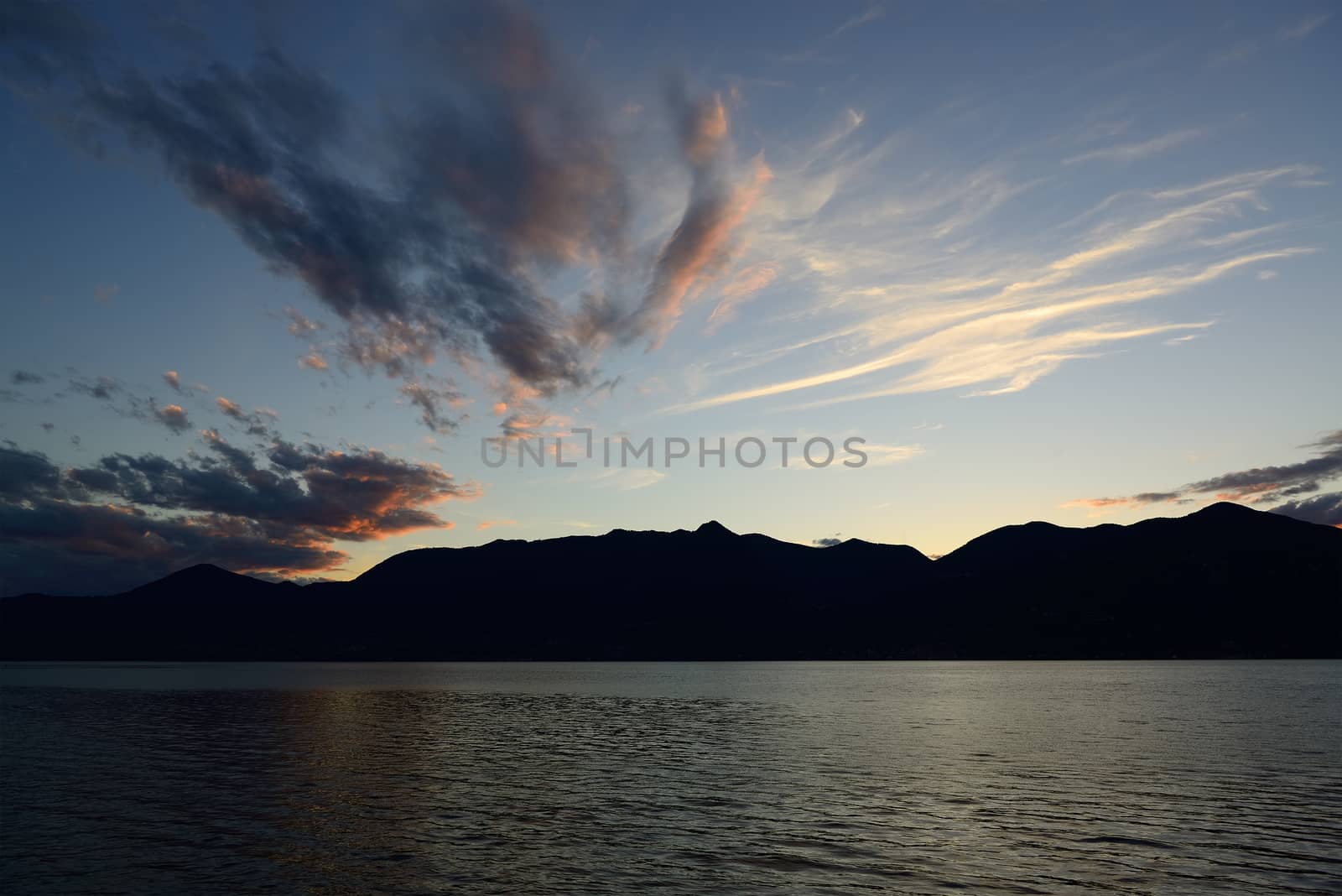 Maggiore lake, sundown from lakefront of Luino