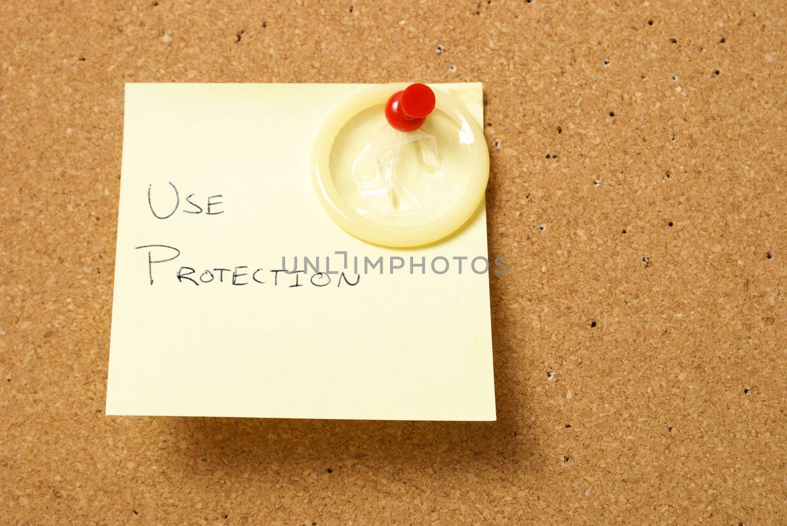 A message board reminds us to use protection for safe sex.