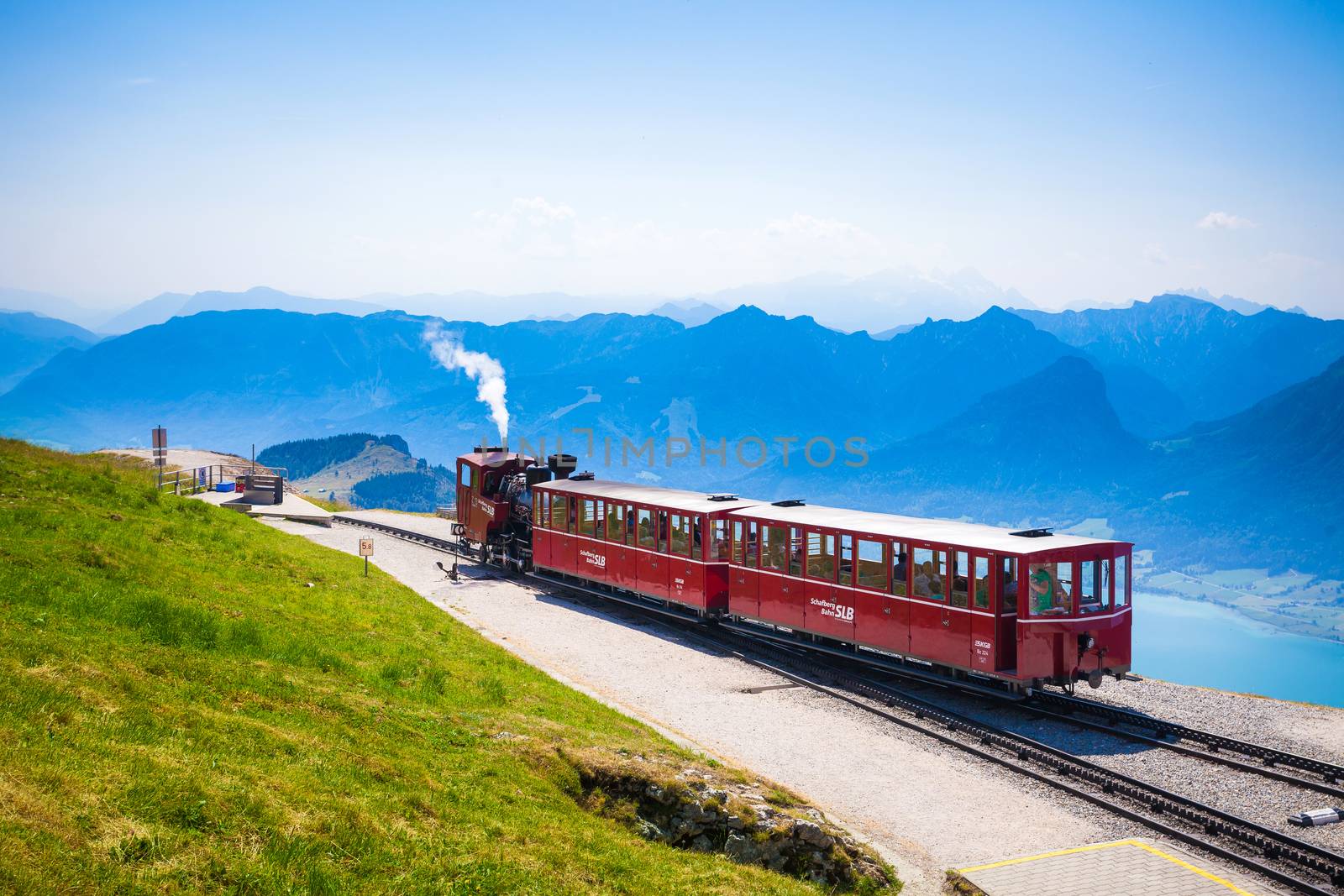 ST. WOLFGANG, AUSTRIA - AUGUST 6: Diesel train railway going to Schafberg Peak (1783m) on August 6, 2013 in St. Wolfgang.