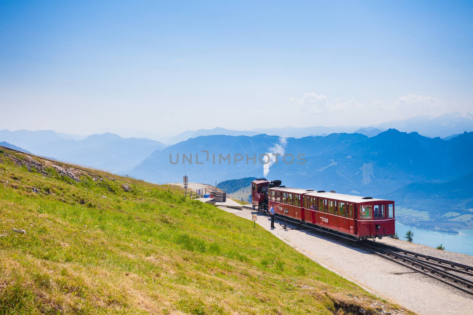 ST. WOLFGANG, AUSTRIA - AUGUST 6: Diesel train railway going to Schafberg Peak (1783m) on August 6, 2013 in St. Wolfgang.